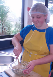 A student stirring the nugget mix