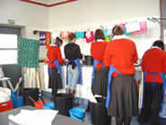 Students dyeing material in the classroom