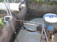 The solid contents of the biodigester flow out into a pit for use as fertiliser.