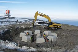 The foundation blocks were backfilled in 200 millimetre layers with excavated material. Photo by Iain Miller.